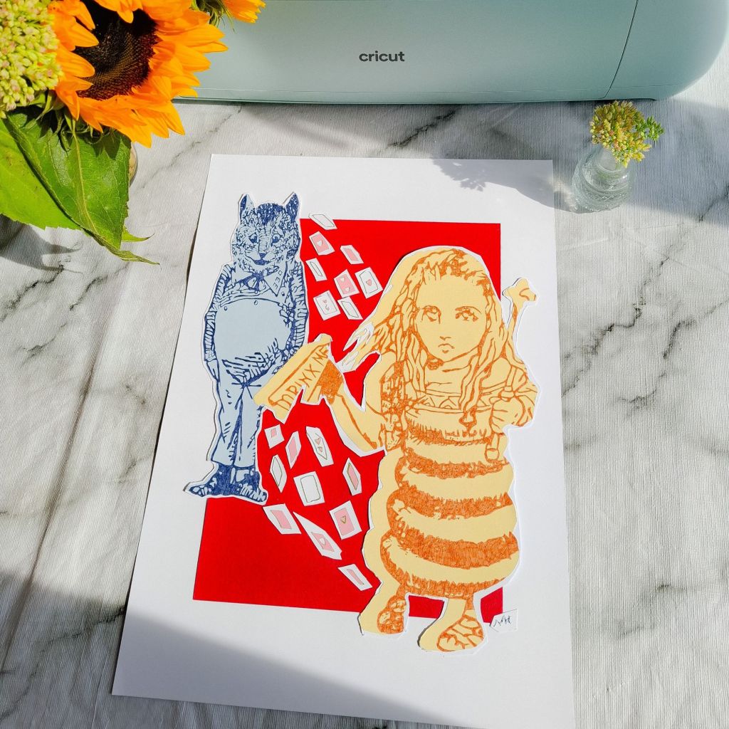 Natalie Knowles' Versions of Alice is photographed with a Cricut machine